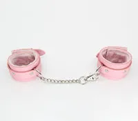 Berlin Baby Faux fur lined vegan leatherette adjustable wrist restraints with detachable chain join Pink and Silver Handcuffs